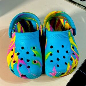 Multi colored child’s Crocs sz c6 only worn a few times, excellent condition $25